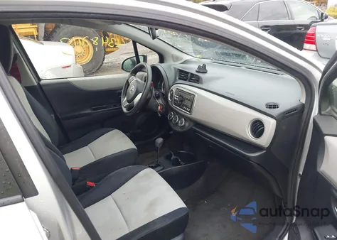 2013 Toyota Yaris Le z USA, uszkodzony, nr VIN JTDKTUD32DD551640